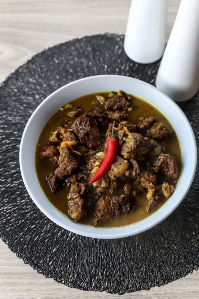 Mindanao's Amazing Flavors:  Tiula Itum -an aromatic soup made with beef or chicken, cook with burnt coconut and mix of spice.