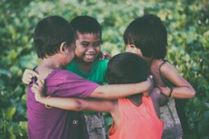 children playing outside - happy childhood